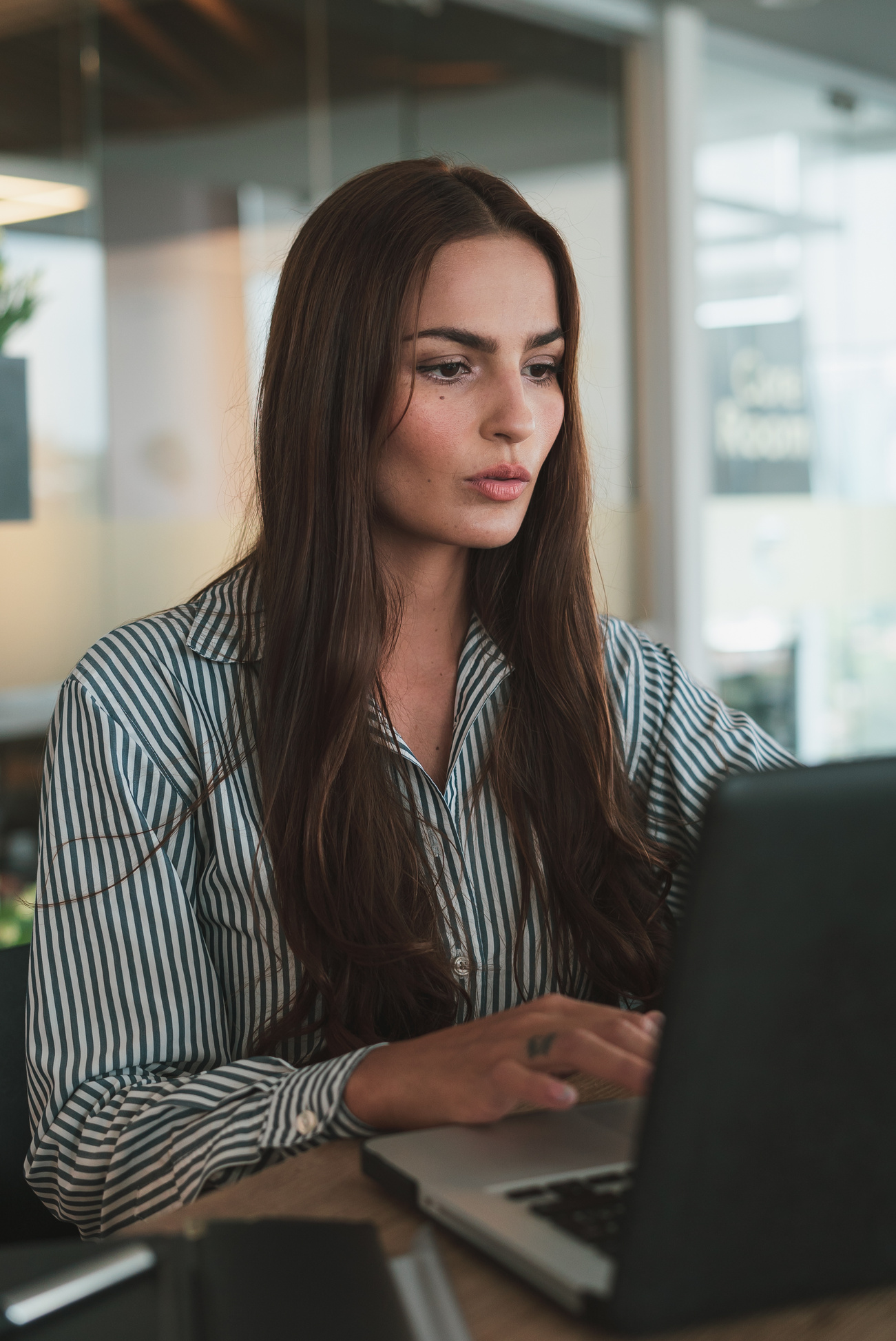 Portrait of Woman Working on Laptop